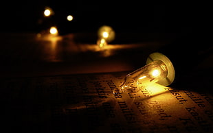 closeup photography of turned on LED bulb