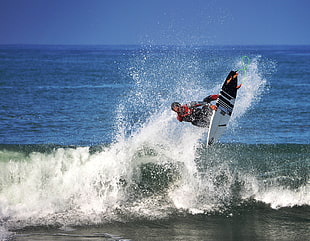 person surfing during daytime HD wallpaper