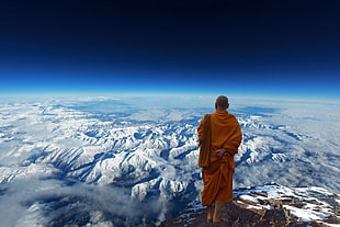 monk on top of mountain HD wallpaper