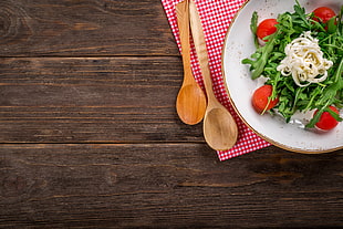 vegetable salad on plate beside brown wooden serving spoons HD wallpaper