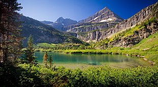 green and gray mountain lake