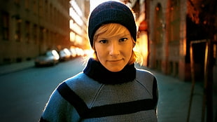 photo of a woman wearing black knit cap