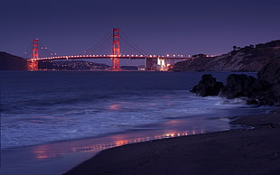 brown and black boat on body of water, bridge, Golden Gate Bridge, sea, night HD wallpaper