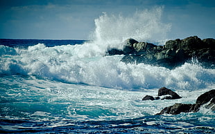 photo of wave crashing stones HD wallpaper