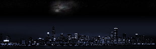 buildings under black sky during nighttime HD wallpaper