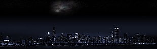 buildings under black sky during nighttime