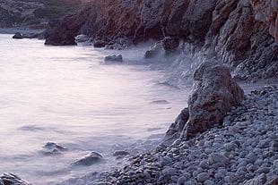 gray rock formation near sea HD wallpaper