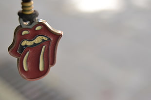 red Rolling Stones pendant, necklace HD wallpaper