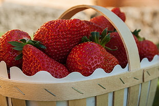 strawberries with brown basket