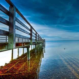 gray metal dock bridge with calm body of water HD wallpaper
