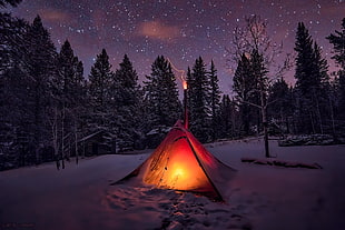 white ten camping on snowfield