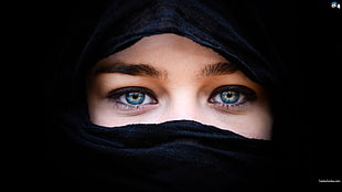 woman wearing abaya headdress
