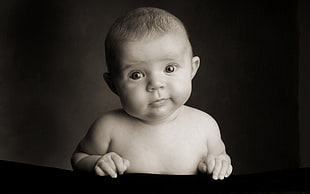 photo of baby with black background
