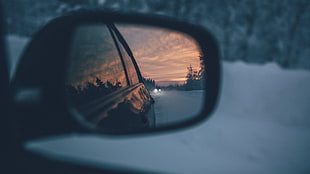 unpaired black vehicle side mirror, photography, sunset, clouds, evening