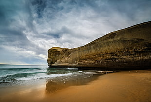 rock formation near the beach HD wallpaper