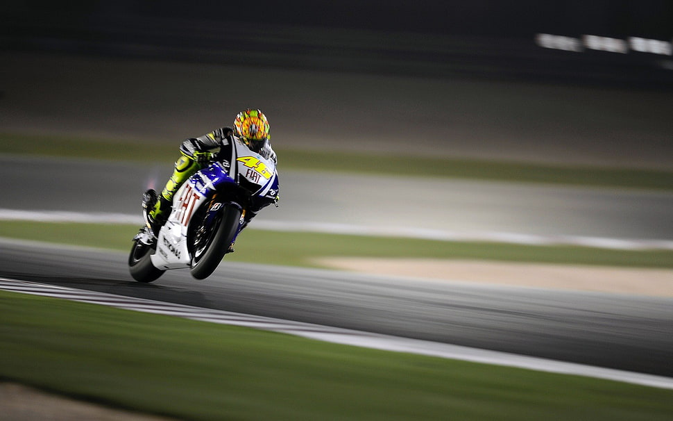 man riding blue and yellow sports motorcycle, motorcycle, racing, Valentino Rossi, blurred HD wallpaper