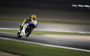 man riding blue and yellow sports motorcycle, motorcycle, racing, Valentino Rossi, blurred