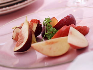 slice fruit on white plate
