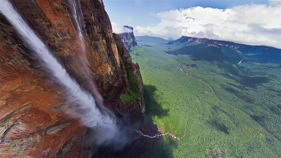 brown and white water fall during day time HD wallpaper