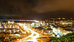 city skyline at nighttime HD wallpaper