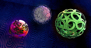 three assorted color balls