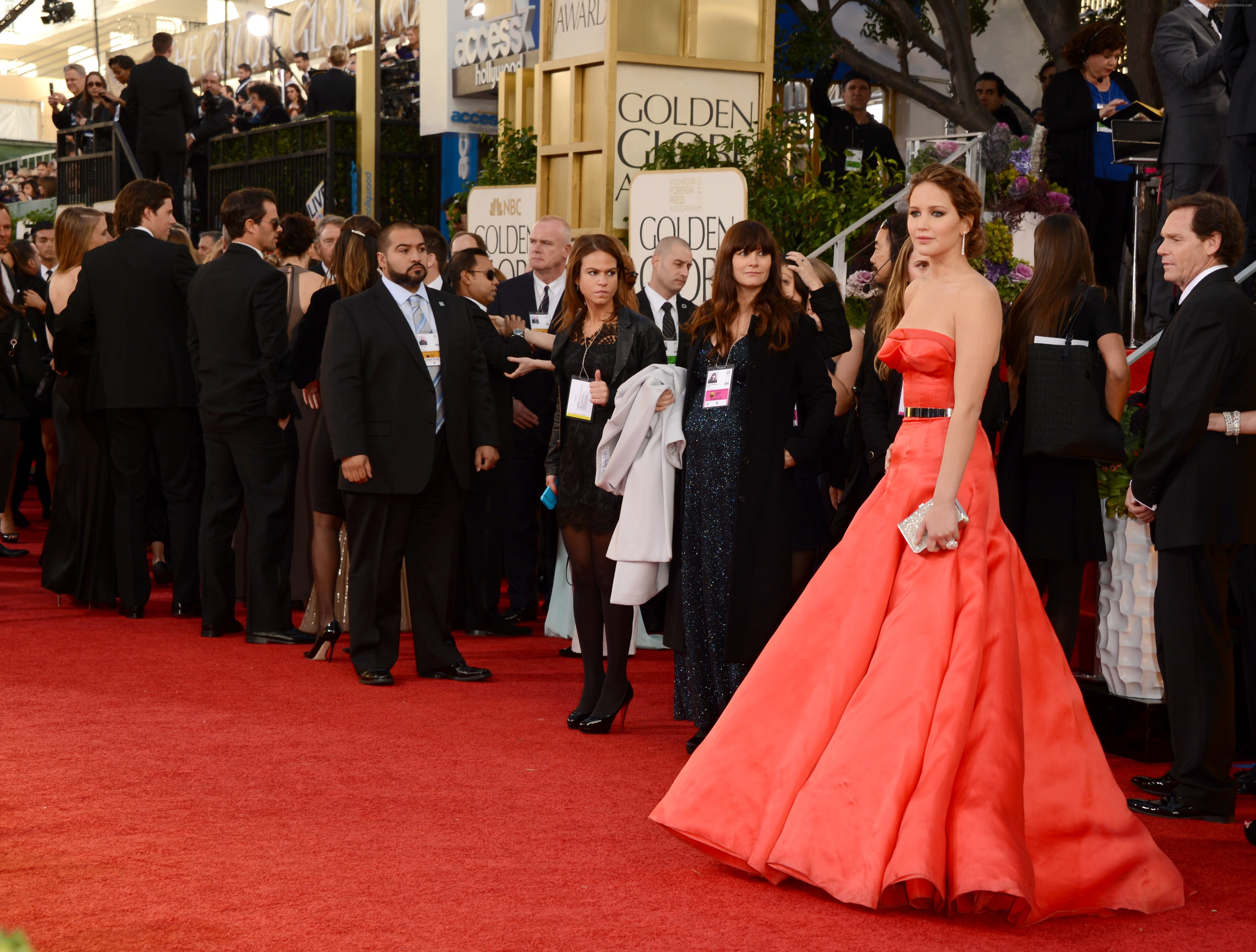 woman wearing pink tube trumpet dress on red carpet