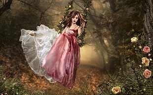 woman wearing pink dress at forest photo