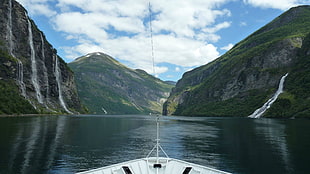 mountain near body of water, boat, clouds, mountains, water