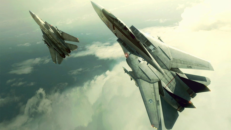 twp gray jet flying on clouds HD wallpaper