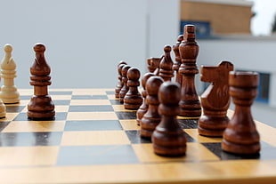 chess pieces on board with bishop moved forward HD wallpaper