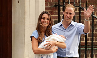 close up photograph of Kate Middleton holding baby