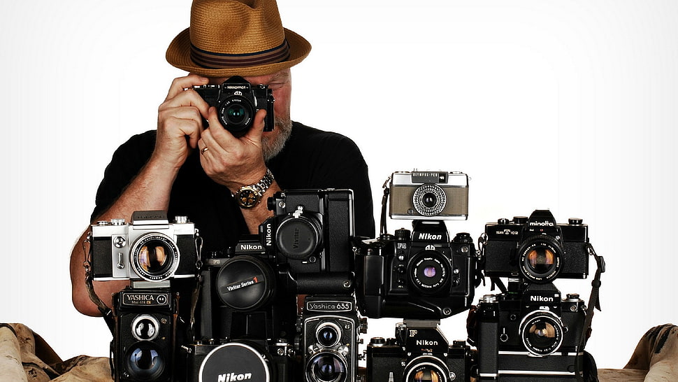 assorted DSLR cameras, Nikon, men, camera, hat HD wallpaper