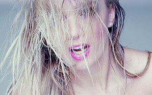 photo of woman with pink lipstick and blonde hair
