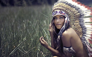 woman wearing native American costume during daytime