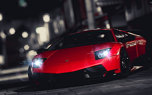 selective photo of red sport car