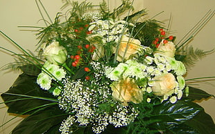 white Chrysanthemums and baby's breath flower bouquet