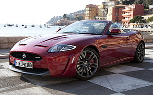 maroon coupe convertible car