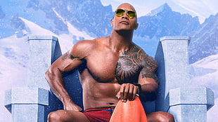 Dwayne The Rock Johnson in Bay Watch sitting on gray concrete stairs holding orange safety pad HD wallpaper