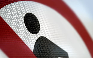 red and black signage in closeup photo