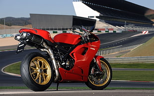 red Ducati sports bike HD wallpaper