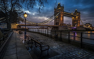 benches beside sidewalk facing body of water and Tower Bridge HD wallpaper