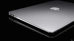 photo of MacBook Air in black background