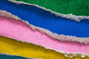 blue, pink, and green textile