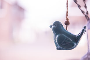 blue ceramic bird figurine