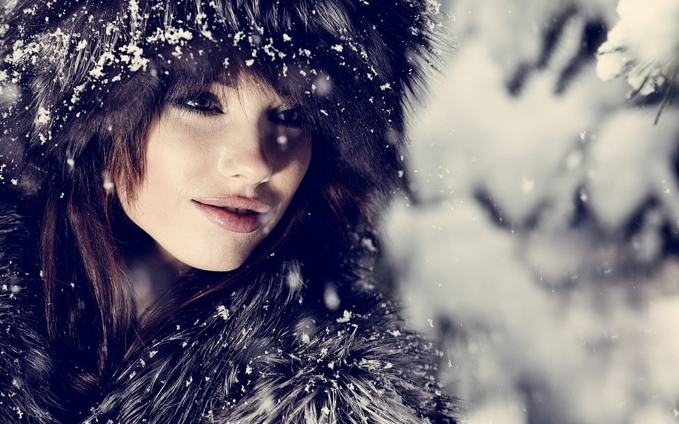 woman in black parka under snow HD wallpaper