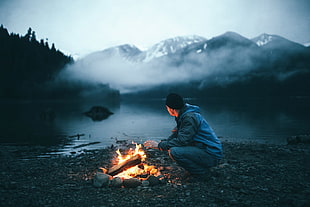 men's gray hooded jacket, fireplace, fire, landscape, men HD wallpaper
