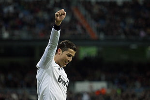 Christiano Ronaldo raising right hand