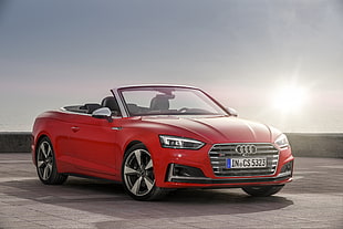 photo of red Audi convertible coupe