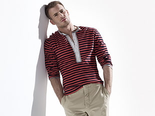 man wearing black and red striped up-button shirt leaning on wall HD wallpaper