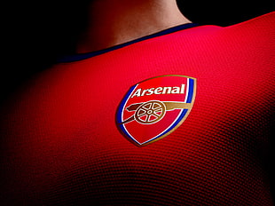 red and blue Arsenal shirt